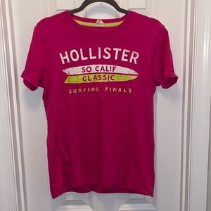Woman’s Pink Hollister shirt sized Medium